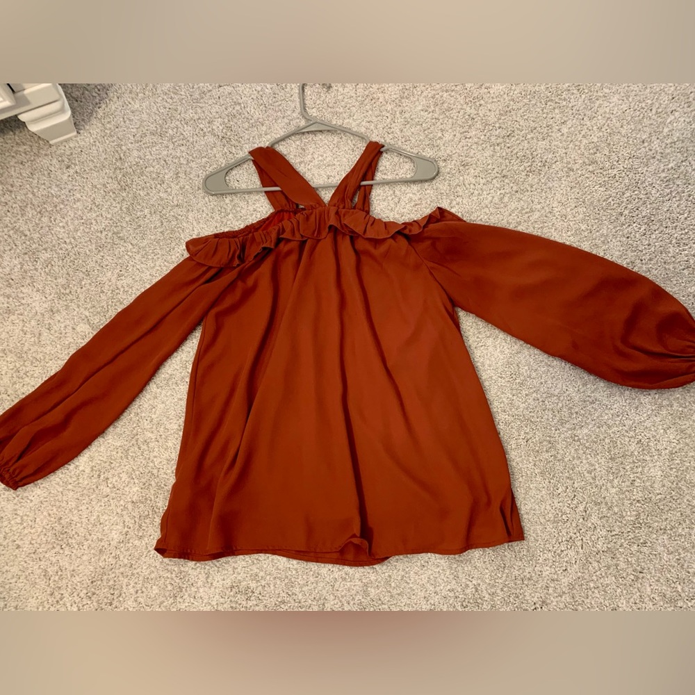 Rust colored peekaboo shoulder blouse
